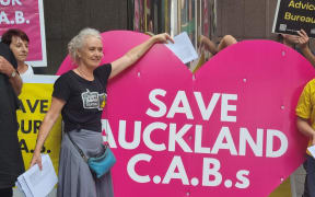 Kate putting the signatures into the heart