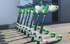 Rack 'em up: Lime scooters for hire outside the TraffiNZ conference on Wellington's waterfront this week - as part of a charm offensive in the capital.