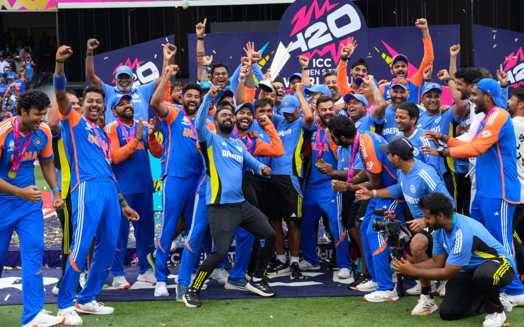 Team India celebrates after winning the ICC men's Twenty20 World Cup 2024 final cricket match between India and South Africa at Kensington Oval in Bridgetown, Barbados, on June 29, 2024. (Photo by Randy Brooks / AFP)