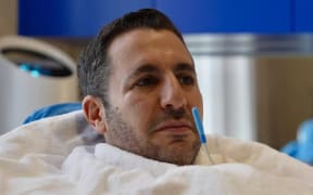 A close-up of Tristan Sternson in a treatment machine at his wellness facility.
