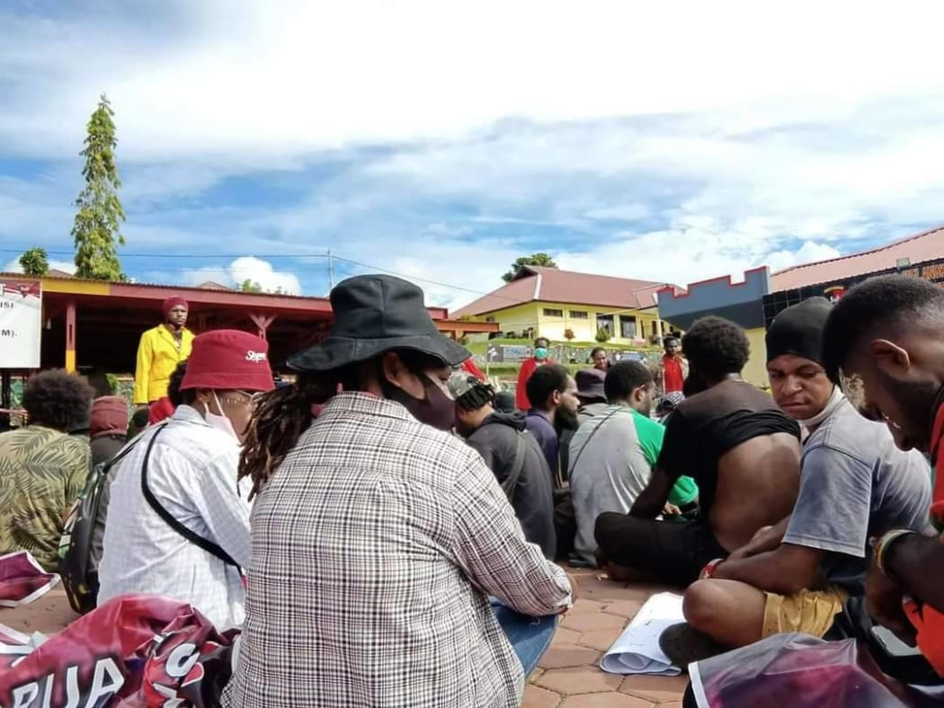 West Papuan protestors held in custody outside a Brimob police station in Manokwari.