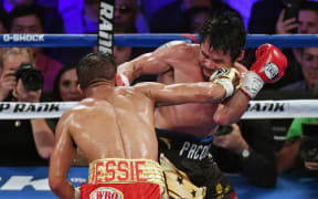 Manny Pacquiao beat Jessie Vrgas to win WBO welterweight title after brief retirement