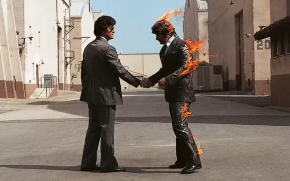 Pink Floyd's Wish You Were Here album cover designed by Hipgnosis.