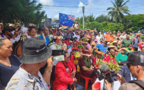 More than 400 people took to the streets a day after the prime minister returned from China, where he signed a strategic partnership deal.