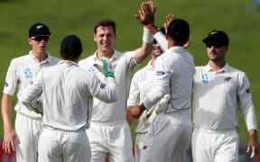 Matt Henry celebrates the wicket of South Africa’s Temba Bavuma.