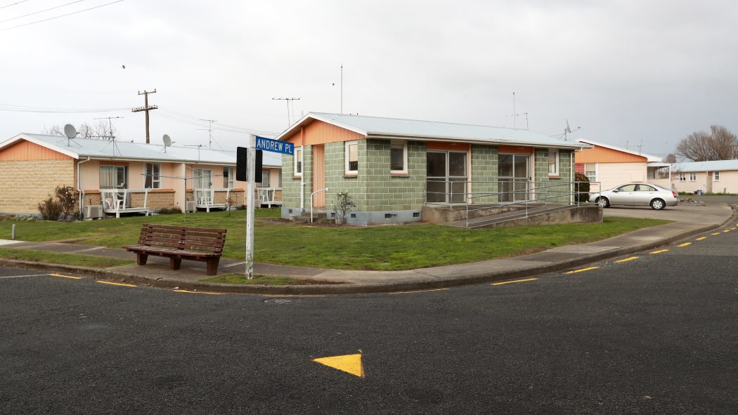 Two studio apartments sit empty at the entrance of Andrew Place.