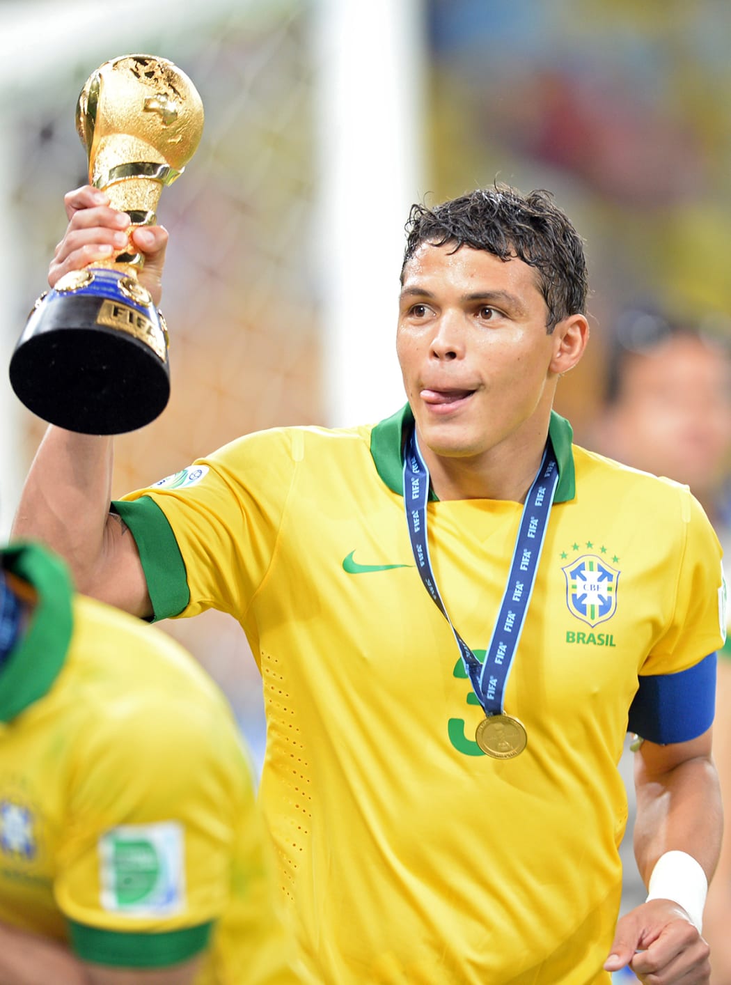 Thiago Silva from Brazil holds the Confederate Cup after Brazil won it in 2013.