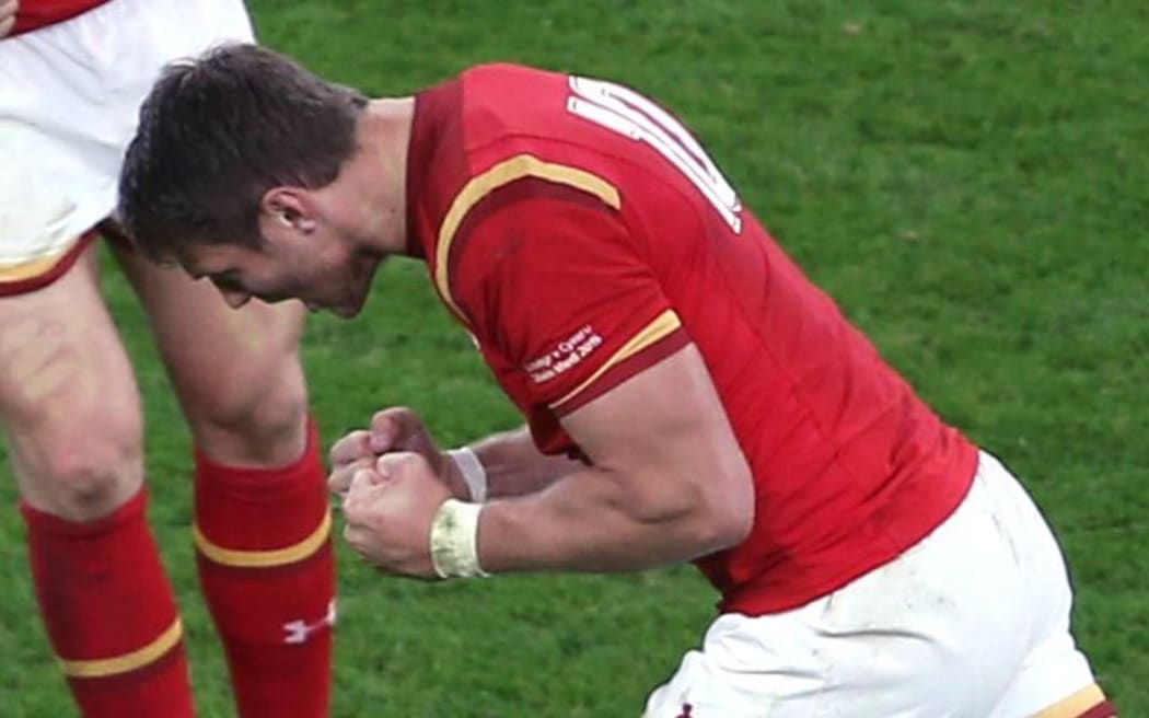 Dan Biggar celebrates after kicking the winning penalty for Wales against England.