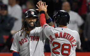 Red Sox players celebrate.
