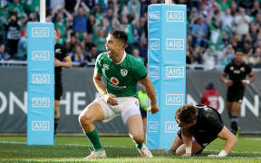 Ireland's Conor Murray celebrates scoring their third try against New Zealand at Soldier Field in Chicago.