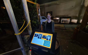 Whangārei bar The Butter Factory employee Breanna Marris demonstrates how the Patronscan system works.