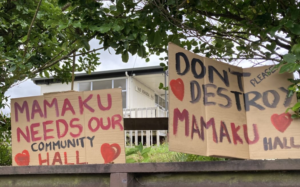 Signs were placed outside the Mamaku Hall following the community hearing it would be demolished. Photo / Laura Smith - LDR single use
