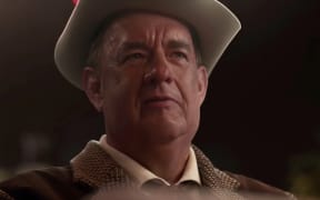 Tom Hanks as Col. Tom Parker in Baz Luhrmann's film Elvis.