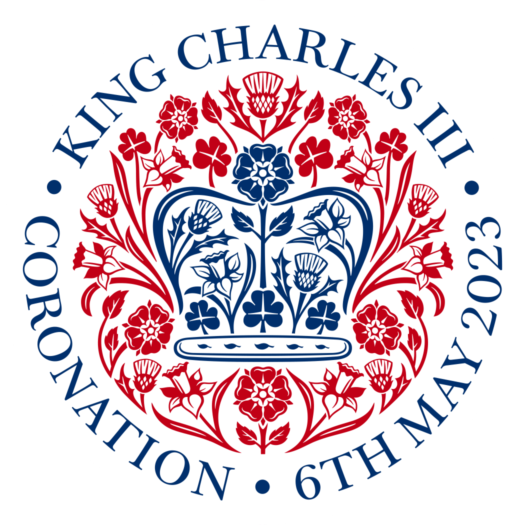 Round logo design with crown and flowers central, words around the outer circle: King Charles III Coronation 6th May 2023.