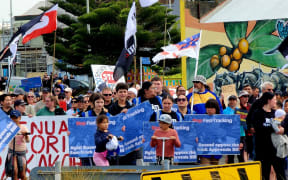 People marching through Patea in a hīkoi to oppose seabed mining, on 2 October, 2024.