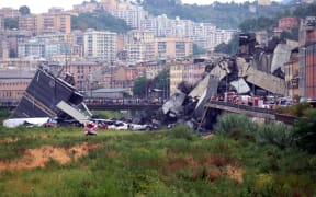 Rescuers scouring through the wreckage after part of a viaduct of the A10 freeway collapsed.