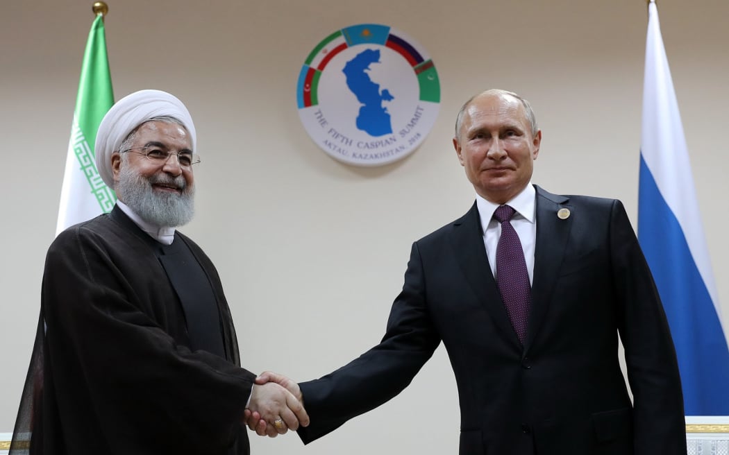 Iranian President Hassan Rouhani, left, and Russian President Vladimir Putin at the Caspian Sea summit.