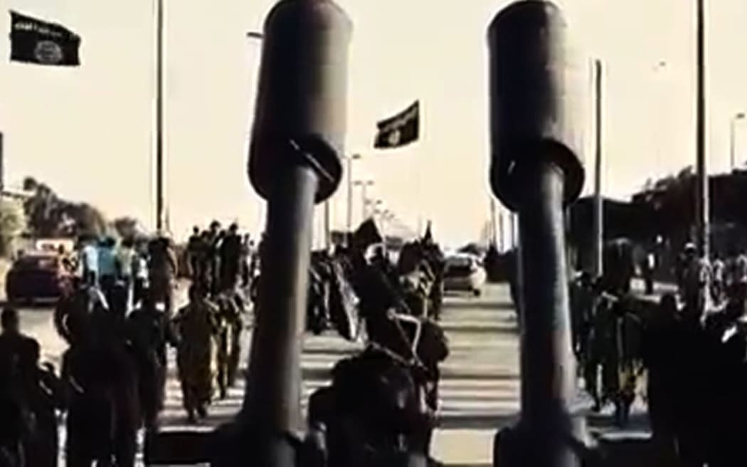 Islamic State images purportedly showing recruits marching in an unknown location.