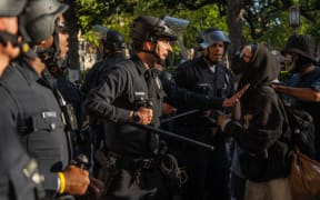 Protesters attempting to establish an occupation in Alumni Park on the University of Southern California campus in Los Angeles, United States, on 24 April, 2024.