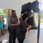 Julie Woods with security guard at Liberty Bell