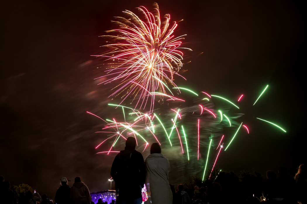 People watch fireworks during New Year's Eve celebrations in Christchurch on 1January 2021. 