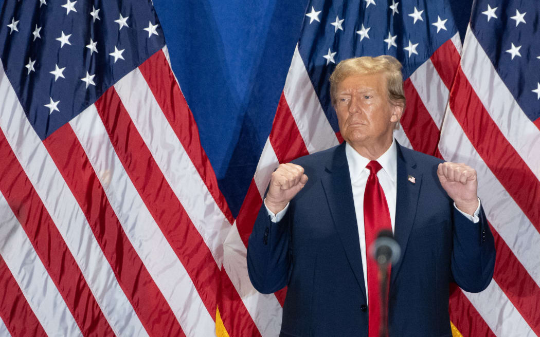 (FILES) Former US President and 2024 presidential hopeful Donald Trump gestures during a "Get Out the Vote" rally at the Greater Richmond Convention Center in Richmond, Virginia, on March 2, 2024. On March 4, 2024, the US Supreme Court unanimously rejected Colorado's bid to take Trump off primary ballot.