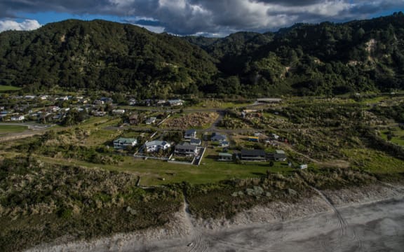 Some residential homes in Matata have been told by council that they are in an area at threat of a deadly landslip but residents don't agree.