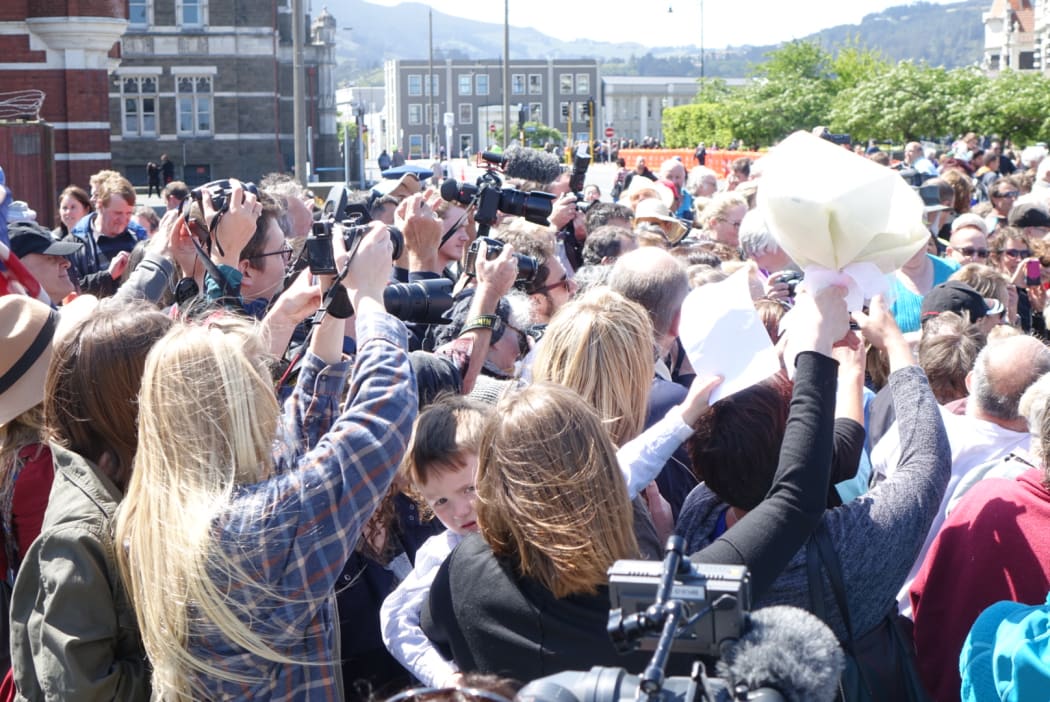 Crowds strain for a glimpse of the royal couple in Dunedin.