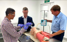 Jeff Sharp, Dr Martyn Harvey and Dr Giles Chanwai working on the prototype.