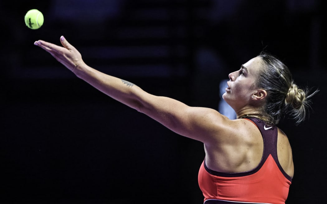 Belarus' Aryna Sabalenka serves against USA’s Jessica Pegula during their tennis match at the WTA Finals in Riyadh on November 4, 2025. (Photo by Fayez NURELDINE / AFP)