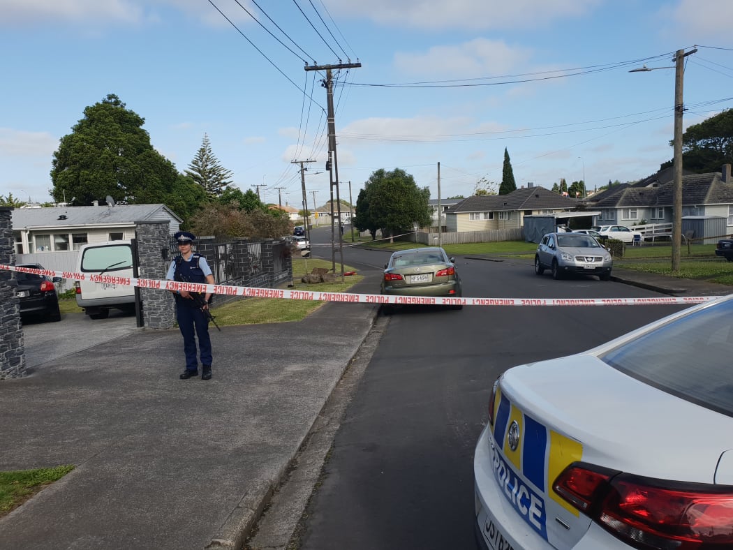 Armed police are protecting a large cordon in Mt Roskill where a person was stabbed and killed last night.