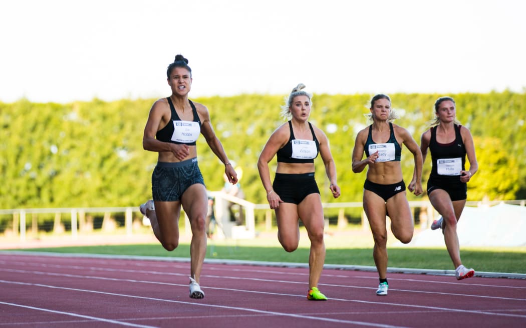 Zoe Hobbs (L) in the women's 100m sprint.