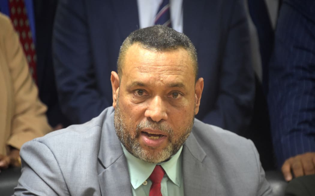 Allan Bird from Papua New Guinea's opposition speaks at a press conference discussing current political issues and rescue efforts for the landslide victims at the Parliament House in Port Moresby on May 28, 2024. Papua New Guinea's government estimates that 2,000 people may be buried underneath a massive landslide that struck a thriving highland settlement in Enga province in the early hours of May 24. (Photo by Andrew KUTAN / AFP)