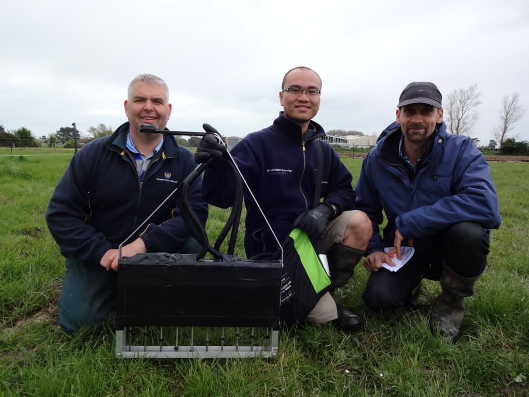 Jay Howes, Quang Mai and James Hanly with a puggometer, which they developed to assess treading damage to the soil.