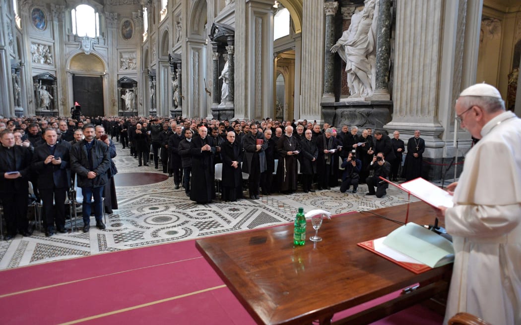 This handout photo taken on March 2, 2017 and released by the Vatican press office, Osservatore Romano, shows Pope Francis gesturing as he speaks during a meeting with priests at the St. John in Lateran basilica, in Rome.