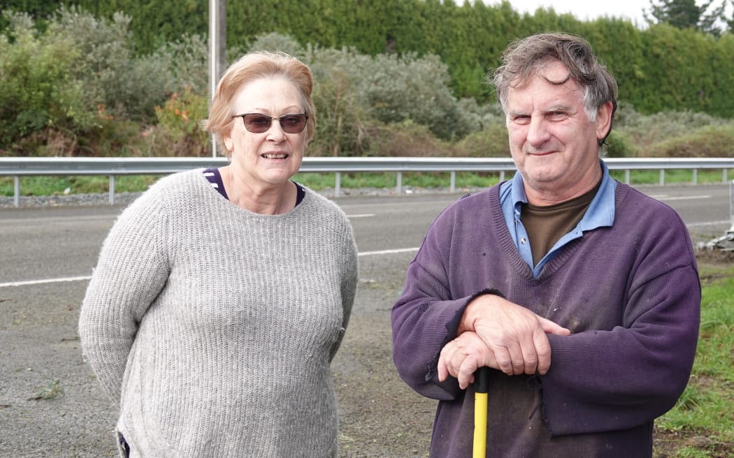 Molly Page and John Andrews are concerned the new barrier on the side of SH57 means they don't have room to pull over before turning into their driveways.