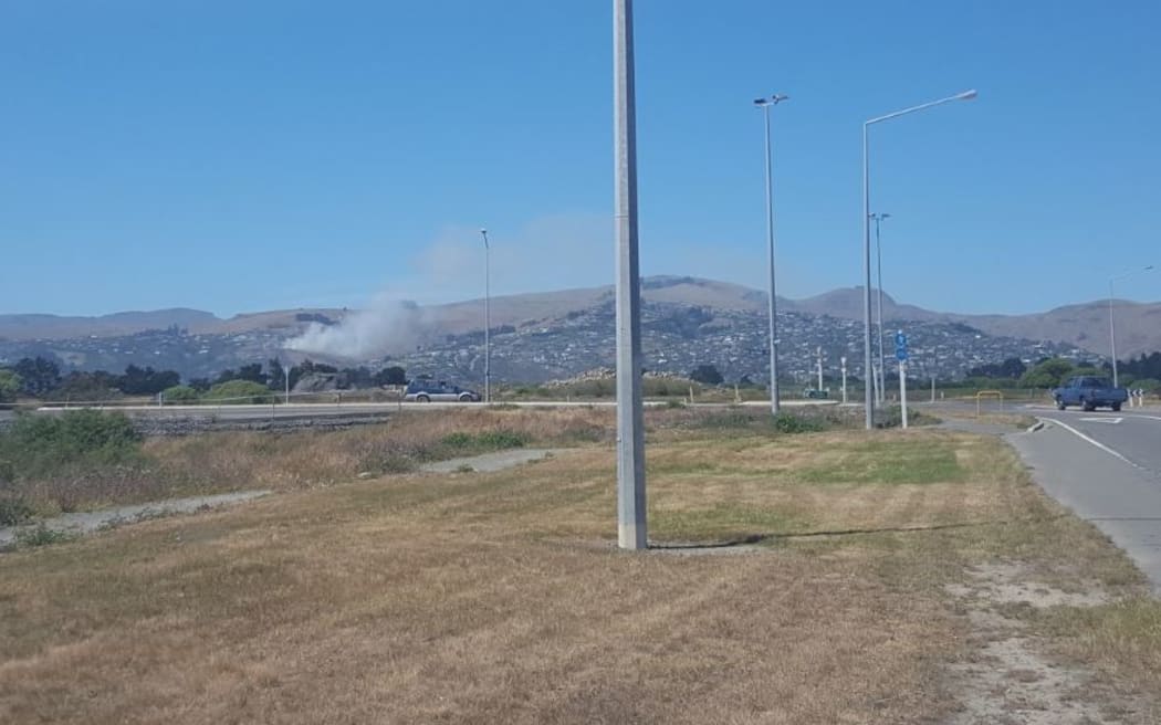 Smoke can be seen from a fire near Christchurch.