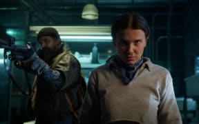 STRANGER THINGS. (L to R) David Harbour as Jim Hopper and Millie Bobby Brown as Eleven in STRANGER THINGS. Cr. Courtesy of Netflix © 2025