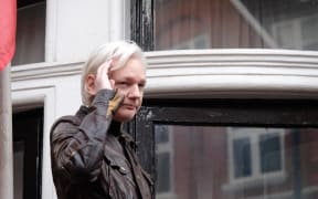 Julian Assange speaks to the media from the balcony of the Embassy Of Ecuador on May 19, 2017 in London.