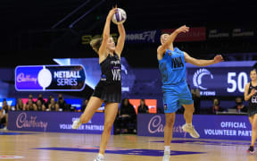 Silver Ferns Kate Heffernan (left) with Aotearoa Men Eriata Vercoe during the Cadbury Netball Series Silver Ferns v NZ Men game one at TSB Arena in Wellington on 10 October 2021.