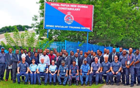 Close Protection Personnel with the Chief Superintendent, Kabib Lamu (seated front fifth from left) at the RPNGC Specialist Training Centre in Port Moresby.