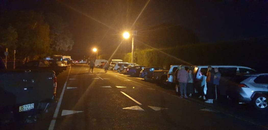 Dozens of cars at Haumoana School in Hawke's Bay, where people from coastal communities of Te Awanga and Hawke's Bay have self-evacuated.