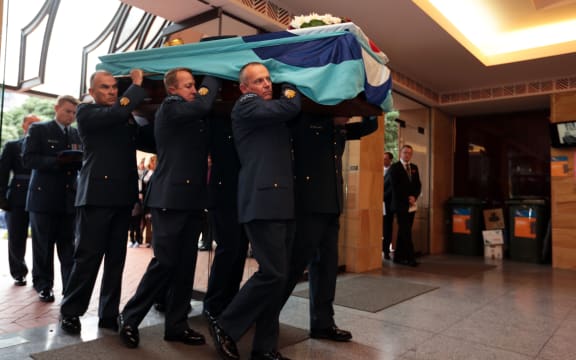 Sir Richard Bolt's coffin is carried into the church.