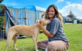 Shantelle with her dog at the campground.