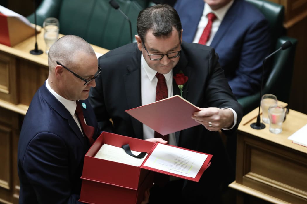 Associate Finance Minister David Clark holds the box of printed budget speeches for the Finance Minister Grant Robertson to hand out.