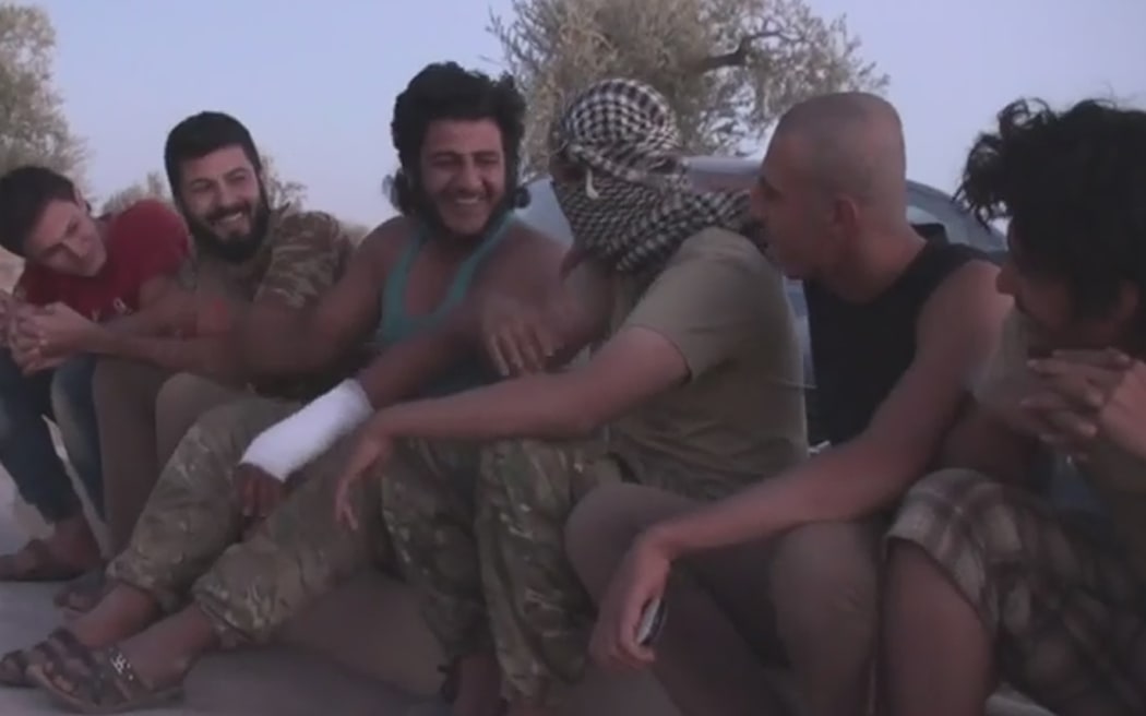 Men at the secret camp for Islamic State defectors in Syria.