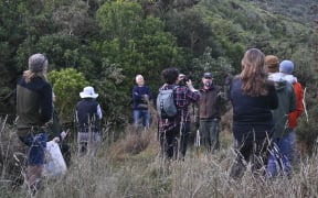 Tim Park (centre with hat) sharing Long Gully Bush Reserve's history with trustees.