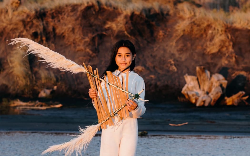 girl with homemade kite