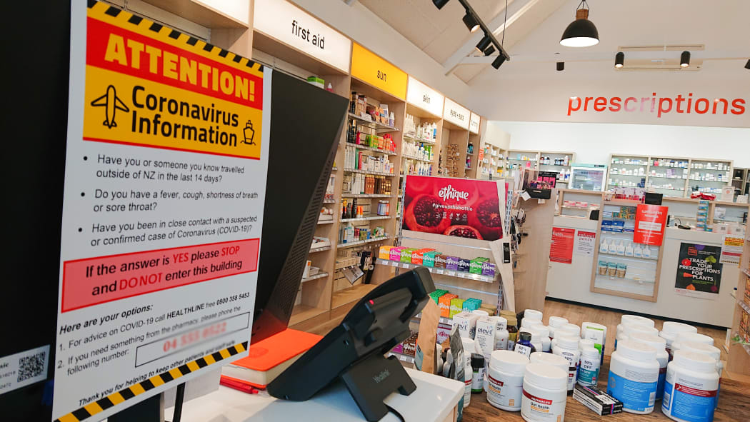 A sign in a pharmacy about coronavirus