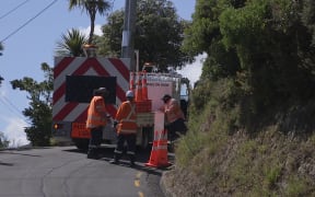 Contractors deal with slip at Point Howard in Lower Hutt.